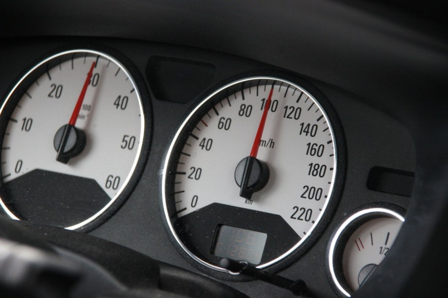 A view of a tachometer in a car.