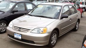 A 2001 Honda Civic on display at a used car lot.