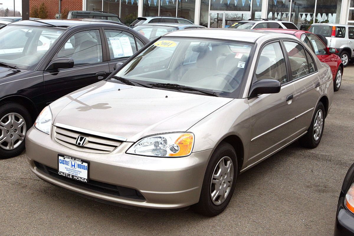 A 2001 Honda Civic on display at a used car lot.