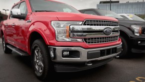 2018 Ford F-150 parked in a lot with other models. Avoid it for a reasons.