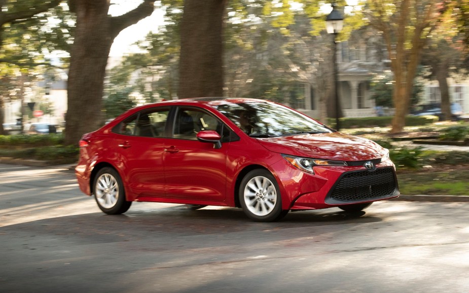 A Toyota Corolla, like this one cornering in a city, is one of the most popular used cars in states like California. 