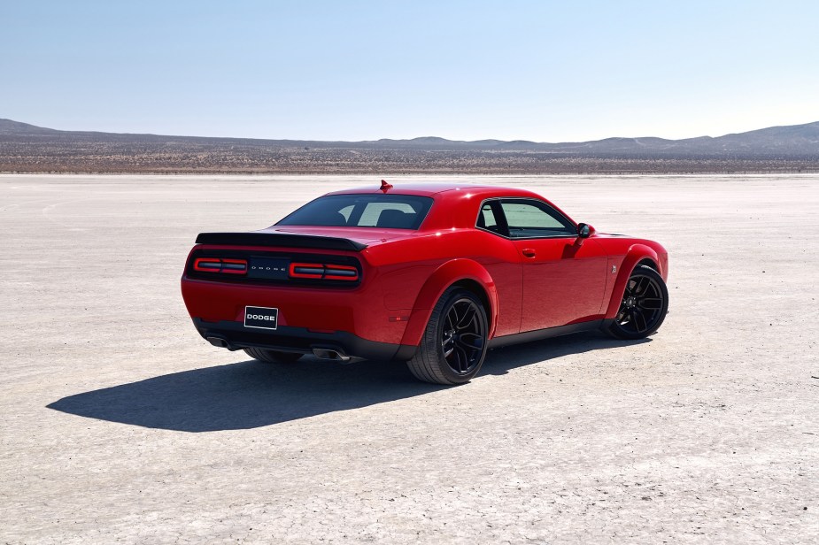 A 2023 Dodge Challenger Widebody looks like a heavy car, like this one showing off its flared fenders and wide tires.