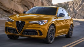 A yellow 2023 Alfa Romeo Stelvio Quadrifoglio luxury crossover, is it worth over $85,000?