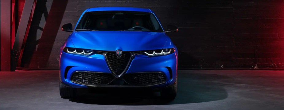 A blue 2024 Alfa Romeo Tonale luxury crossover with a reasonable starting price