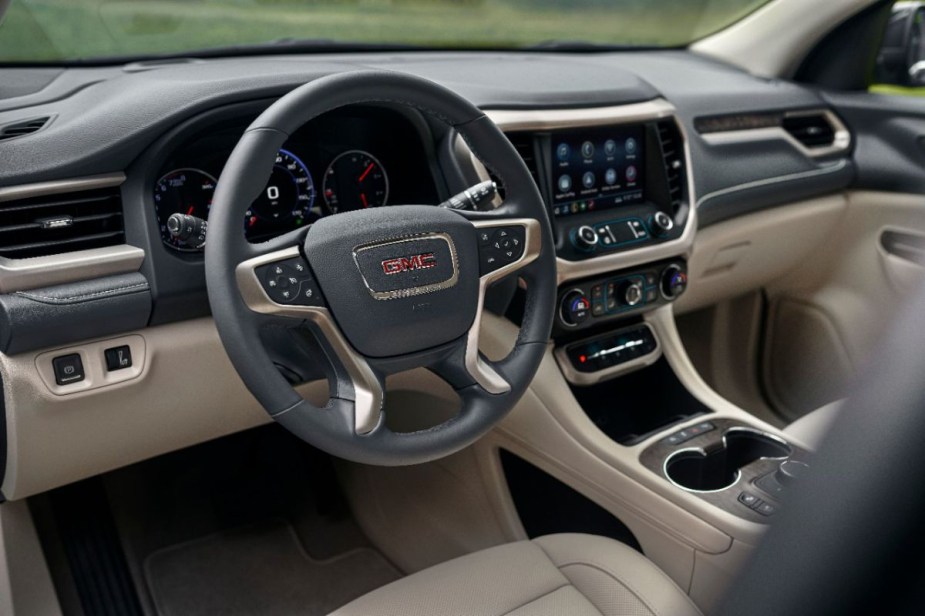 A GMC Acadia Denali SUV's interior.