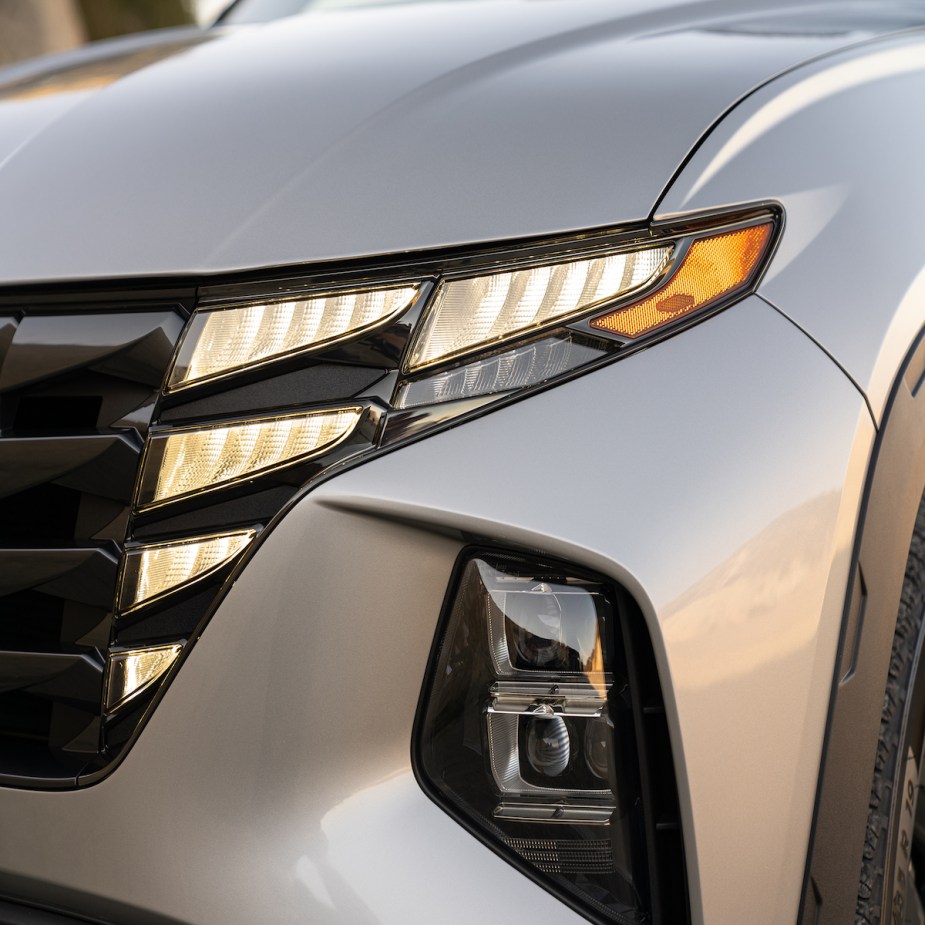 A silver 2023 Hyundai Tucson headlight, which is one of the small SUVs to buy.