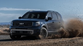 The 2023 Kia Telluride X-Pro off-roading in dirt