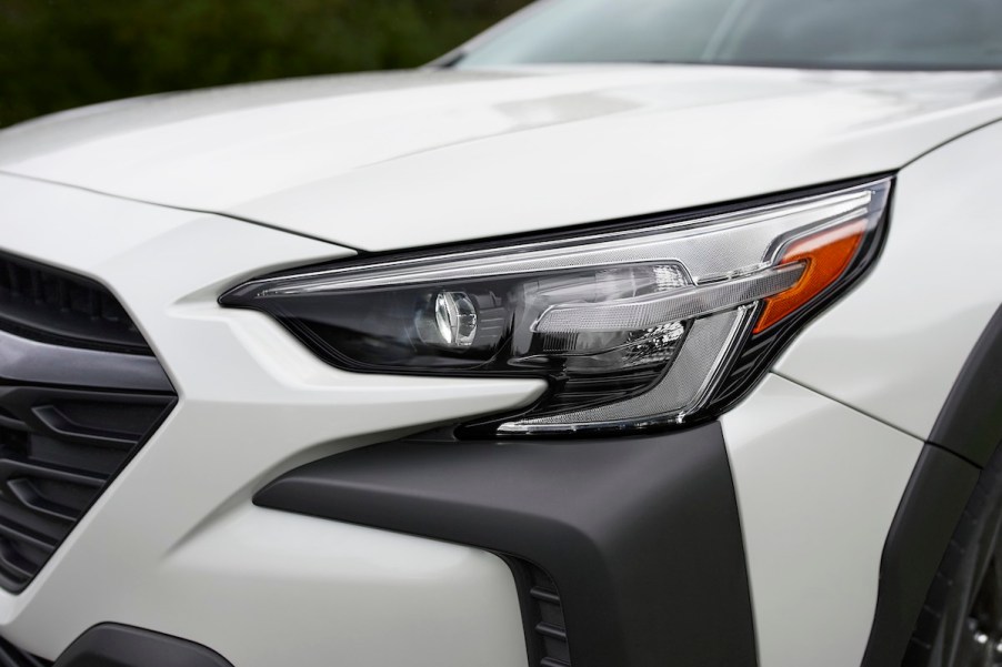 A white 2023 Subaru Outback, which is one of the best midsize SUVs to buy