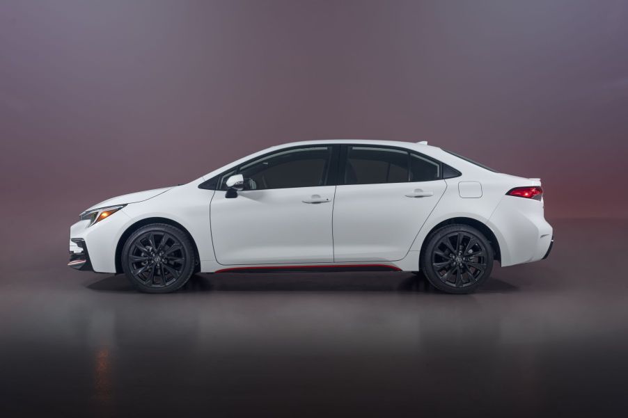 A side profile shot of the 2023 Toyota Corolla Hybrid Infrared Special Edition compact sedan model