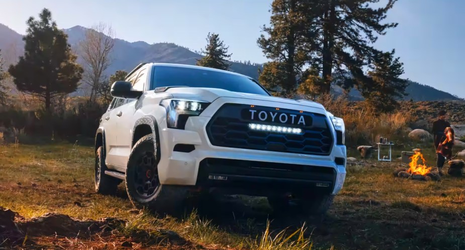 A white 2023 Toyota Sequoia full-size SUV is parked outdoors. 