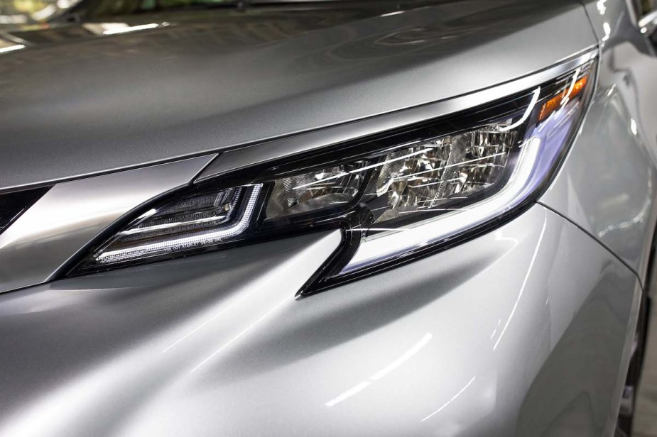 A silver 2023 Toyota Sienna headlight. 