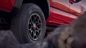 A red 2023 Toyota Tacoma, which is one of the trucks most likely to last.