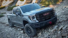 A 2022 GMC Sierra 1500 AT4X full-size truck off-road driving.