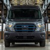 A Ford E-Transit delivery van in a warehouse.