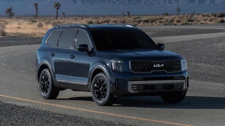 Front angle view of blue 2023 Kia Telluride midsize SUV