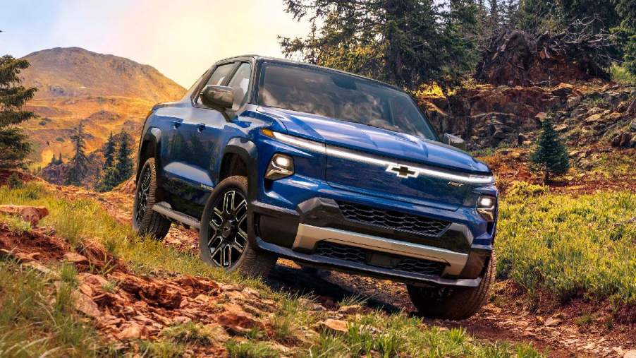 Front angle view of blue Chevy Silverado EV, highlighting new Chevy small electric pickup truck to top the Ford Maverick