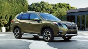 Front angle view of green 2023 Subaru Forester crossover SUV