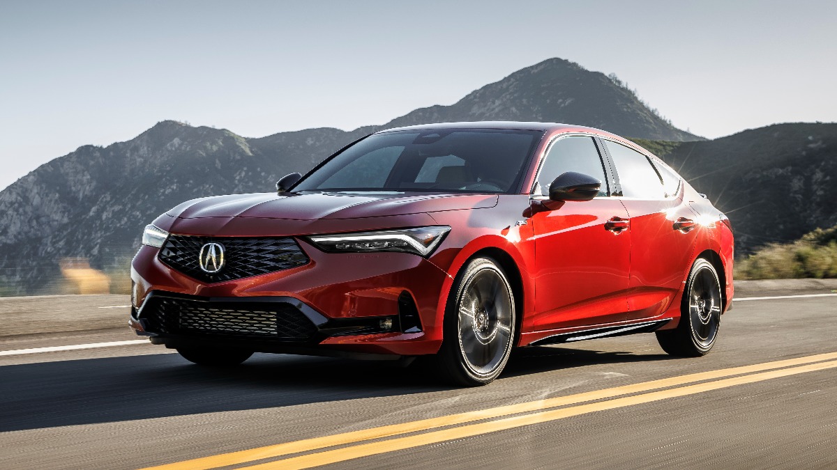 Front angle view of red 2023 Acura Integra luxury car, cheapest new Acura and NACTOY Car of the Year winner