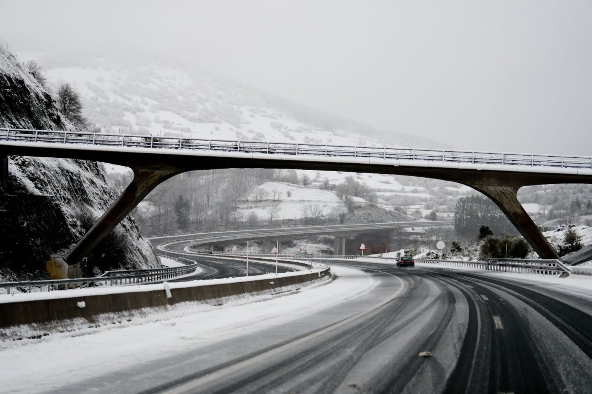 A car driving on a snowy road