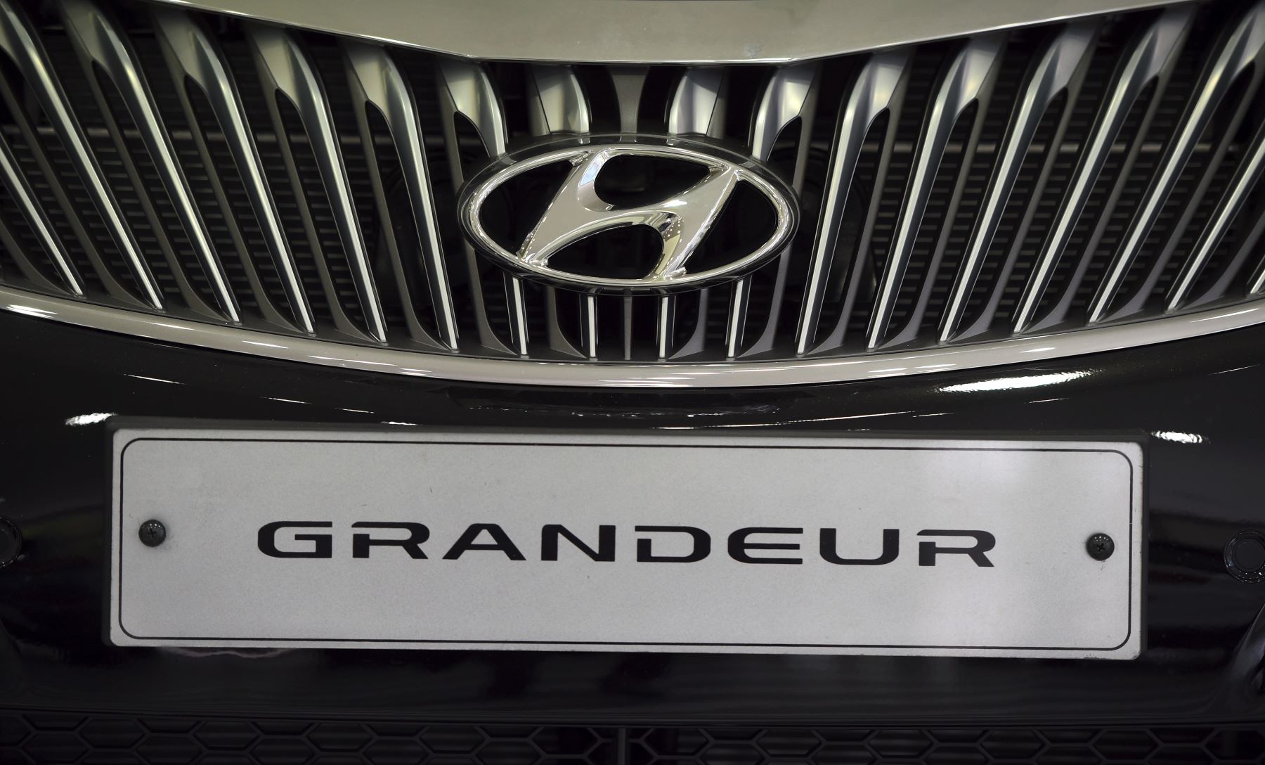 A Hyundai Grandeur grille and nameplate at a Hyundai dealership in Seoul, South Korea, October 2016