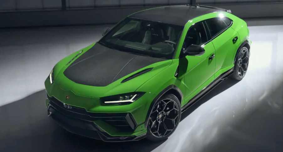 A green Lamborghini Urus SUV is parked.