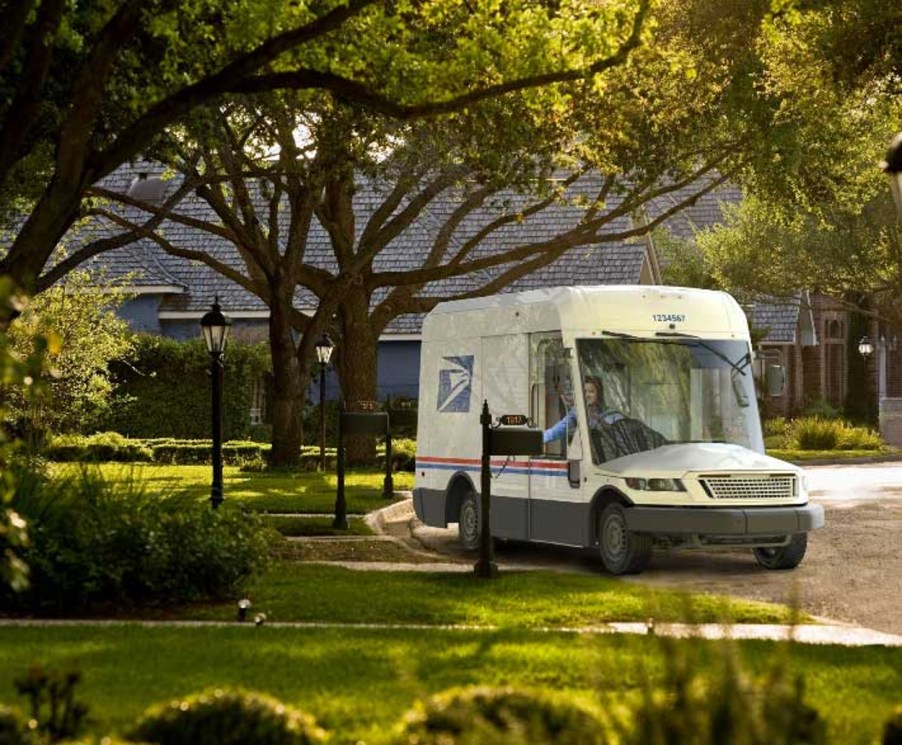 An Oshkosh NGDV mail truck is out making deliveries, it might be an electric mail truck.