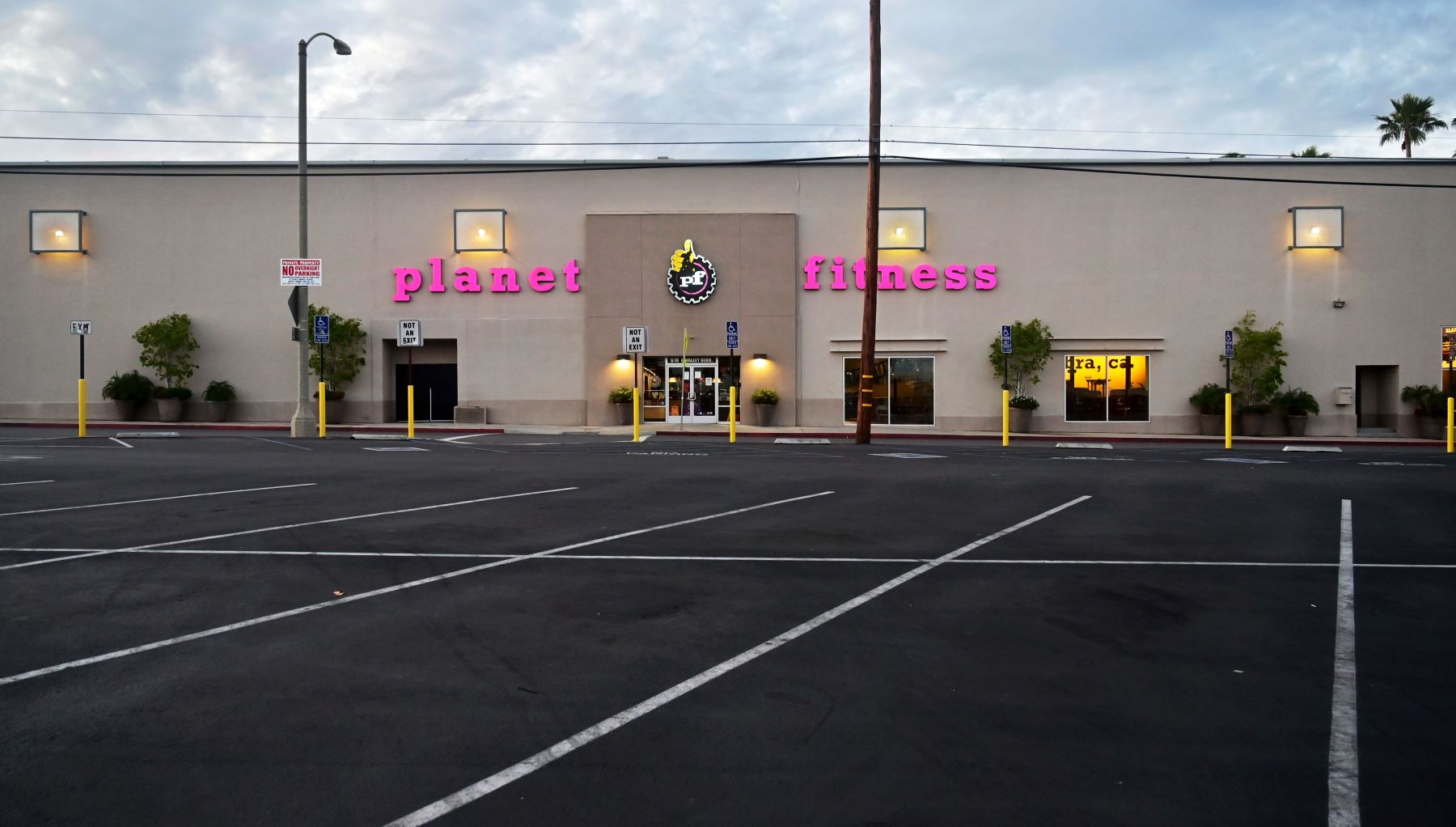 An empty Planet Fitness gym fitness club car parking lot in Alhambra, California