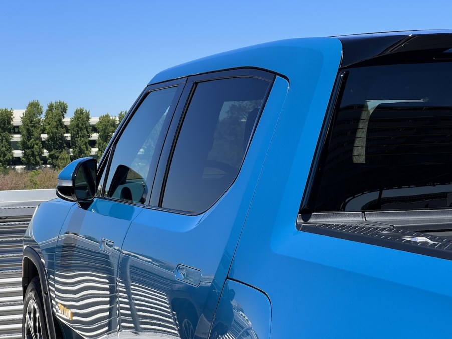 A blue Rivian R1T, which is one of the best electric trucks.