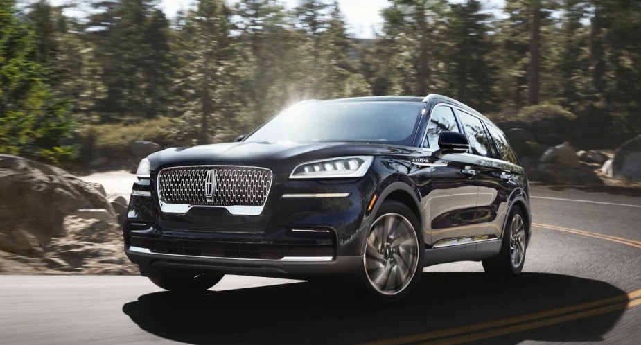 A black 2023 Lincoln Aviator midsize luxury SUV. 