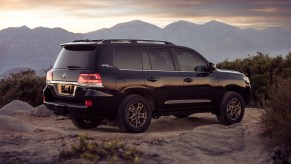 A Toyota Land Cruiser, which are models most likely to last, parked out in a rocky area.