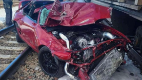 Toyota Supra MkIV crushed like a coke can