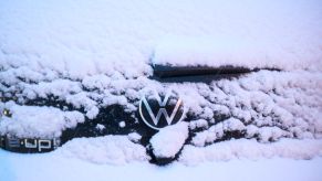 A Volkswagen e-Up! electric car covered in snow in Lower Saxony, Laatzen