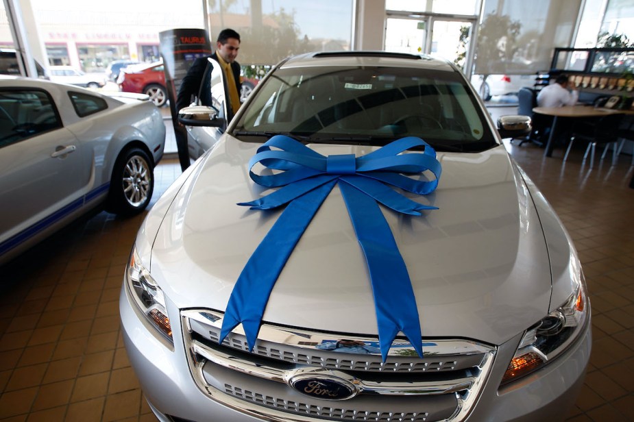 A new Ford car at a dealership.