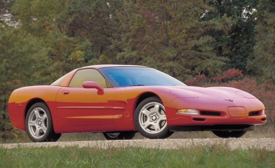 A red-orange fifth generation (C5) 1997 Chevrolet Corvette Coupe