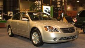 A gold color 2002 Nissan Altima.