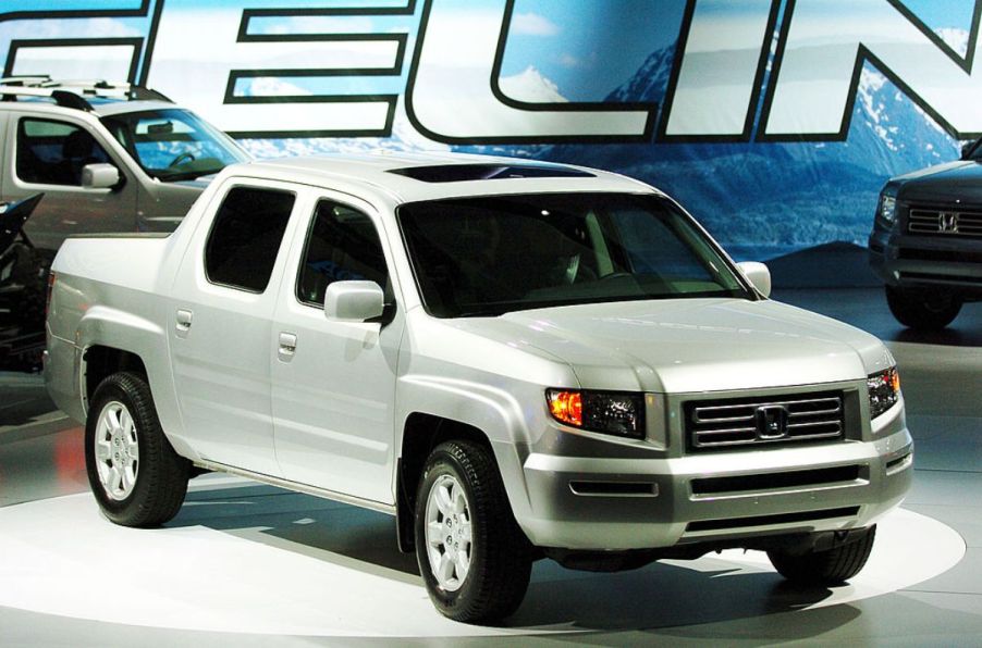 A 2006 Honda Ridgeline on display at an auto show.