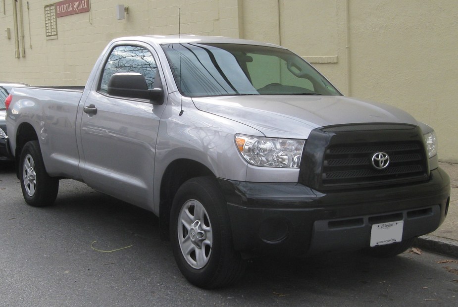 A 2010 Toyota Tundra sits parked on the street as a full-size truck.