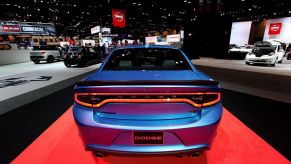 A 2015 Dodge Charger on display at an auto show.