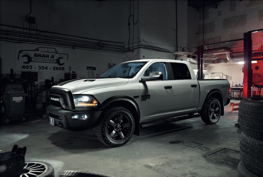 White Ram 1500 pickup truck parked in a garage because of common engine problems.