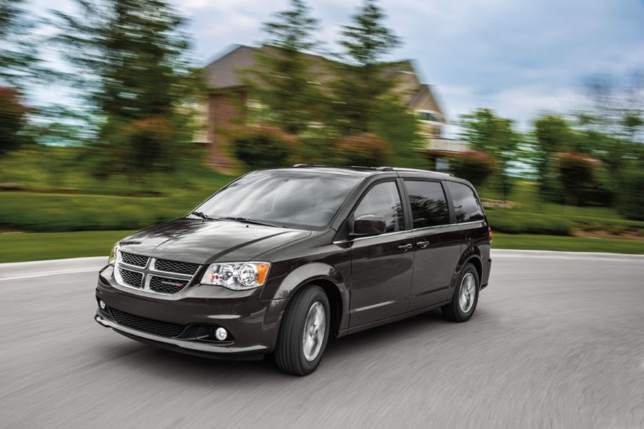 A 2020 Dodge Grand Caravan driving down the road.