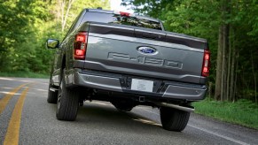 A 2023 Ford F-150 driving down the road, which is one of the best full-size trucks of 2023.