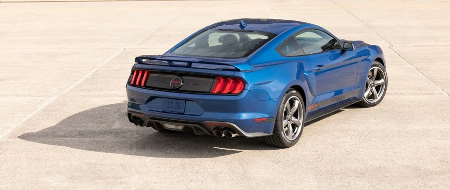 The Ford Mustang GT, the cheapest V8 car in the Ford lineup, shows off its California Special package and blue paintwork. 