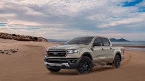 A tan 2022 Ford Ranger Splash Sand Edition midsize pickup truck model driving on a sandy beach