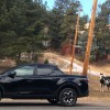 2022 Hyundai Santa Cruz next to horses