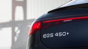 2022 Mercedes-Benz EQS 450+ rear badging with the Golden Gate Bridge in the background