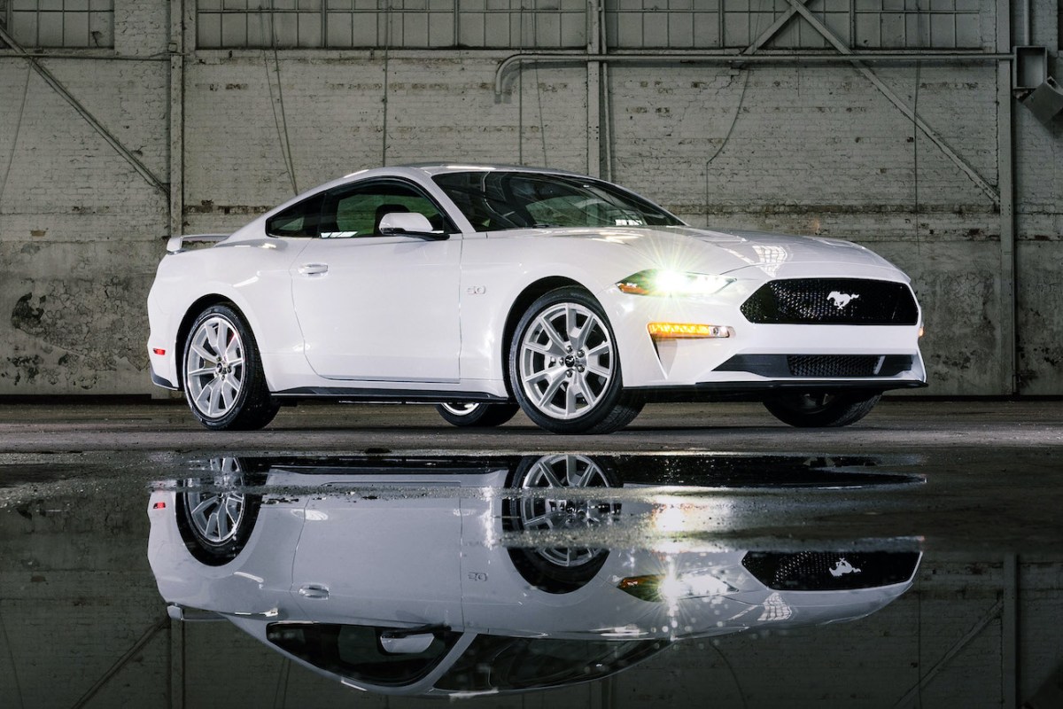 A white 2023 Ford Mustang on display.