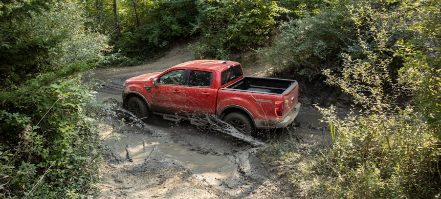 A red Ford Ranger outdoors.