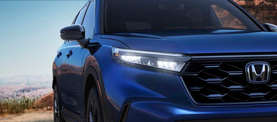 A blue Honda CR-V parked outdoors. 