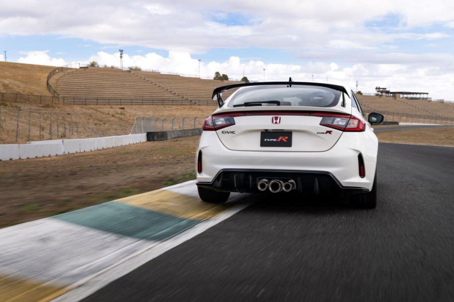 A white 2023 Honda Civic Type R performance hatchback model at the Sonoma Raceway track