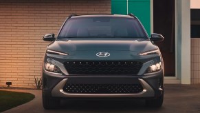 A black 2023 Hyundai Kona subcompact SUV is parked.